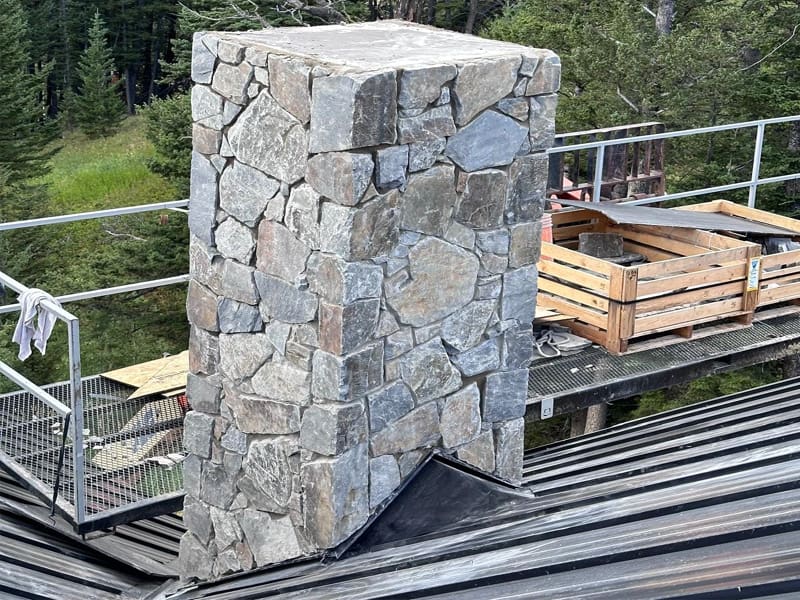 Natural Stone Chimney completed by Martini Stone Masonry in Calgary and surrounding Alberta communities.