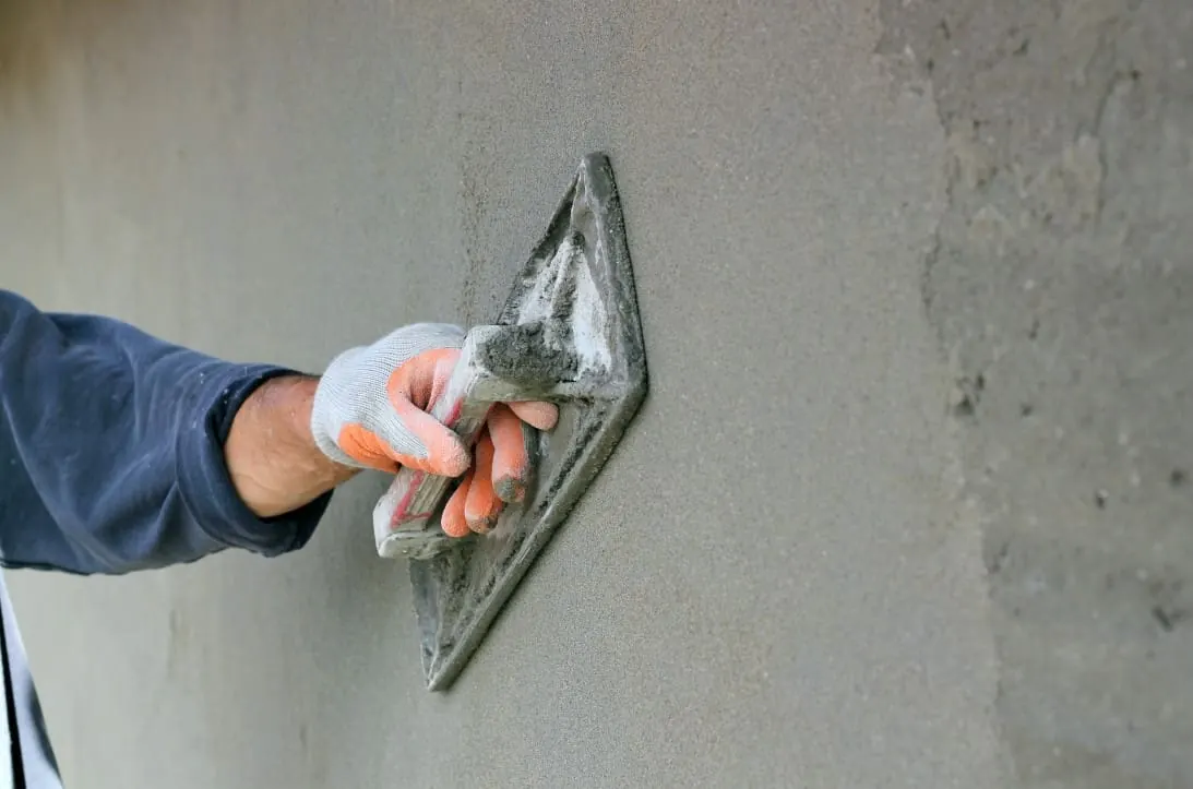 Parging application on a Calgary foundation