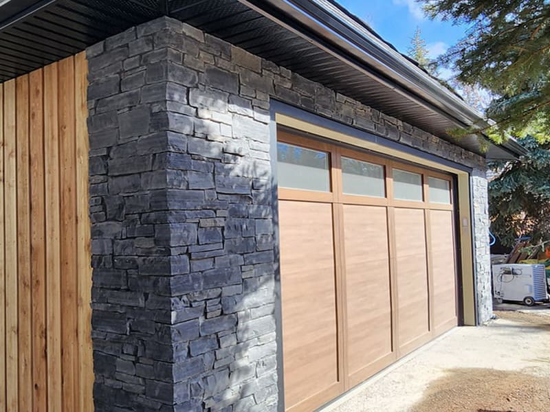 Natural Stone Veneer Exteriors Natural stone veneer installed on a residential exterior in Calgary